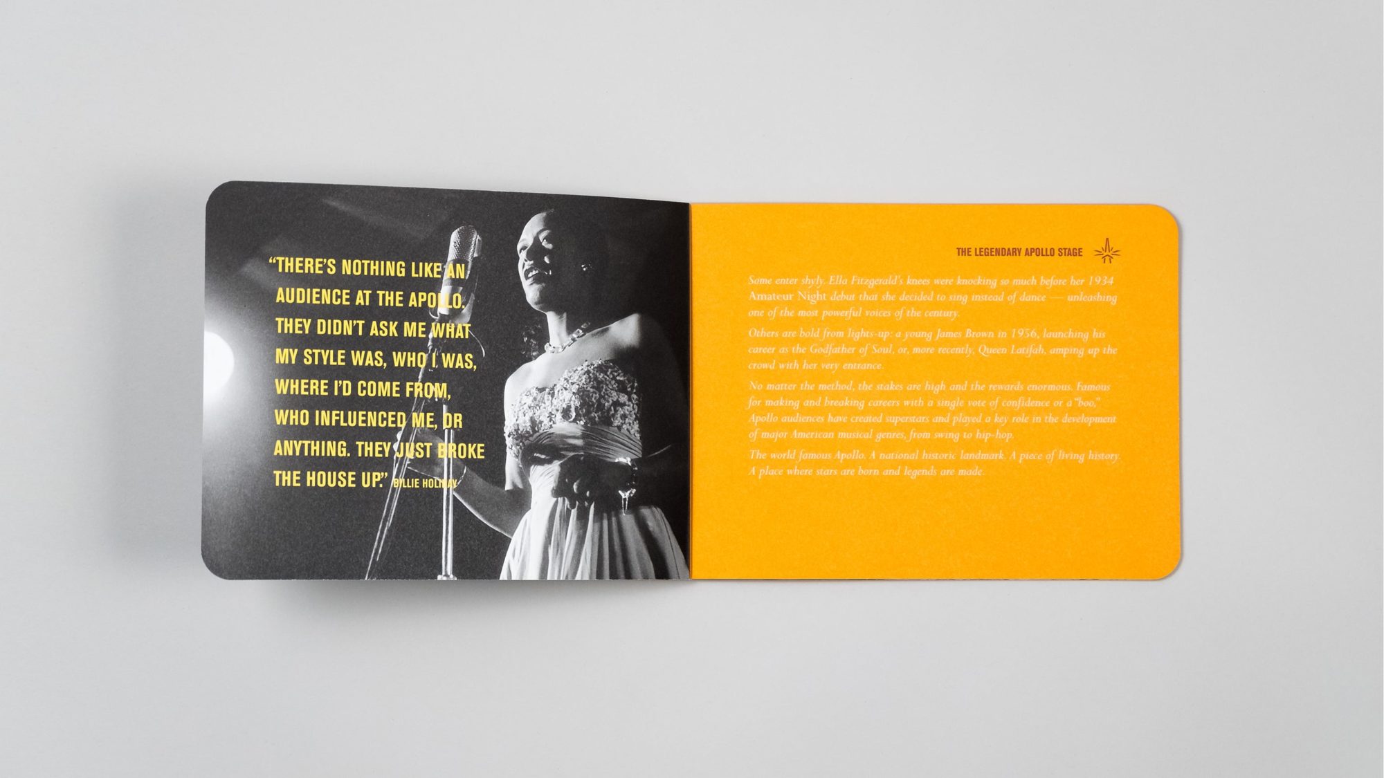 Interior spread with striking image of Billie Holiday on stage. Accompanying the image is a quote from her about what it was like to perform at the Apollo Theater